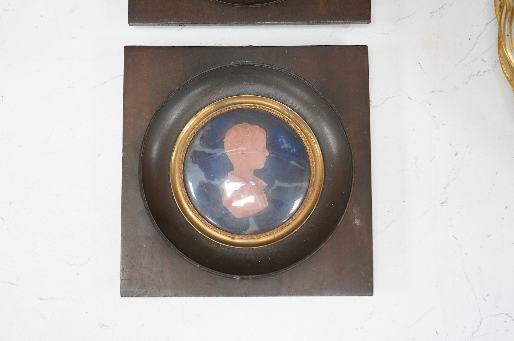 Francesco Pozzi (1779-1844), pair of tondo wax portraits of Henry and Louisa Drummond, framed, overall 13.5cm high